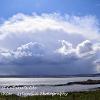 Clouds over St Cuthberts Isle  Limited Print of 5   Mount Sizes A4  16x12  20x16