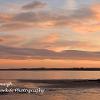 Setting over Dunstanburgh   Limited Print of 5 Mount Size 20x12